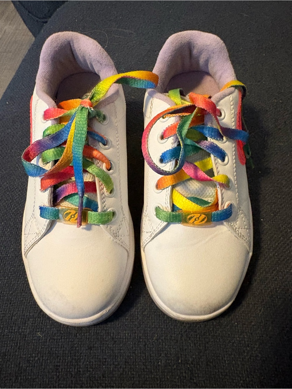 Heelys Roller Tennis shoes. Youth size 13. Used but good condition.